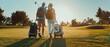 © COK House - A man and a woman in golf attire are walking on a course, carrying bags on carts. The scene includes trees, sand traps, and a clear, sunny sky.