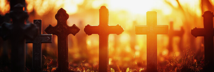 All Saints' Day for Western Christians. the Christian cross. a burning candle about memory. graves in the cemetery