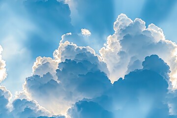 Expansive Sky with Cumulus Clouds and Sunlight Filtering Through