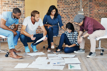 Poster - Meeting, collaboration and creative business people planning on floor, writing notes and discussion. Teamwork, documents and team working on strategy, project or report in office boardroom on ground