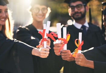 Fototapete - Degree, students and graduation huddle in outdoor, diploma celebration and solidarity for support. People, friends and certified together for university success, diversity and study achievement goal