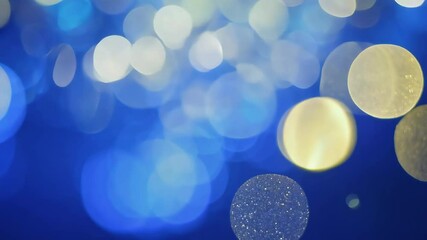 Poster - Glowing blue and gold orbs create a mesmerizing atmosphere during the evening celebration