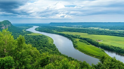 A panoramic view of the Mississippi River winding through a green landscape. No people, copy space.