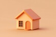 © Keattipoom - Minimalist 3D Render of House Icon on Soft Terracotta Background in Burnt Orange and Tan Palette