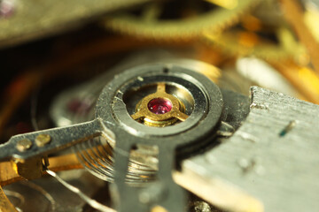 Mechanism of vintage wrist watch as background, closeup