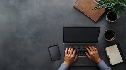 Poster - A workspace setup with a laptop, notebook, coffee cup, and plant in a modern office environment during daylight hours