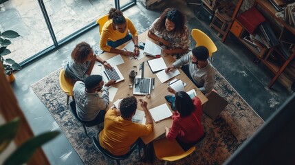 Poster - Team collaboration in a modern workspace during a brainstorming session, fostering creativity and teamwork in a casual setting