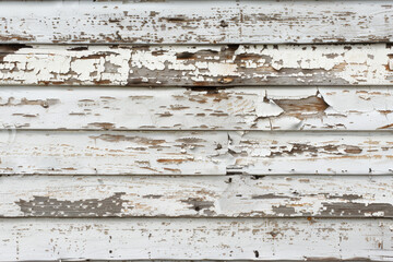 Poster - The image is of a wooden surface with a lot of peeling paint