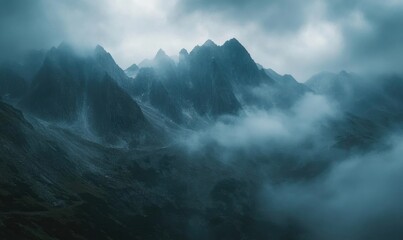 Wall Mural - Dark clouds looming over a jagged mountain range