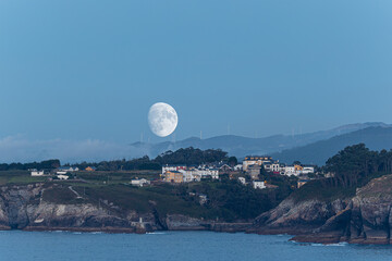 Wall Mural - Playing with the moon and multiple exposure for ideal locations!