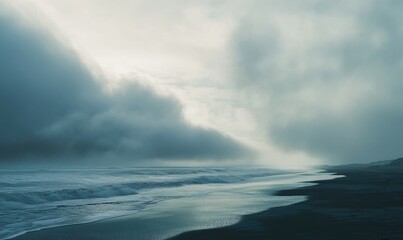 Sticker - Thick, gray clouds moving slowly across the sky, casting shadows over a deserted beach