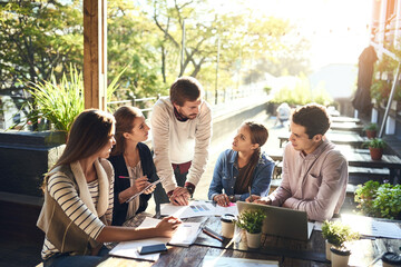 Poster - Business, group and planning in meeting, cafe and ideas for project, graph and laptop with stats. Writing, SEO and teamwork of people, creative and typing of information and discussion of paperwork