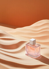 Wall Mural - A perfume bottle is lying on top of clear tape in the middle of dusty pink sand.Minimal creative advertise concept.Trendy social mockup or wallpaper with copy space.Flat lay.