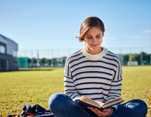 Leinwandbilder - Reading, smile and woman in nature, studying and book of literature, outdoor and education for student. Knowledge, campus and learning in college, person and girl in school, scholarship and grass
