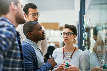 Canvas Print - Office, employee and teamwork on glass wall for strategy with meeting, collaboration and planning. Brainstorming, ideas and vision with sticky notes for project solution for business as web developer