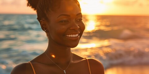 Aufkleber - A woman stands alone on a beach as the sun sets in the sky, with waves crashing against the shore