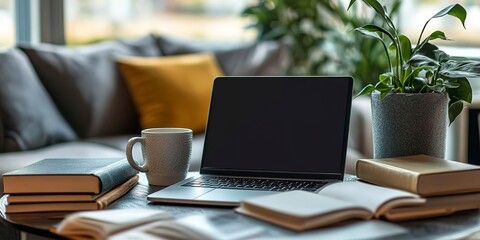 Poster - Modern e-learning setup with a laptop, books, and a cup of coffee, symbolizing online education and distant learning