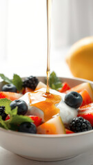 Poster - Drizzling Honey over a Fresh Fruit Salad