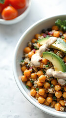 Wall Mural - Chickpea salad with avocado and tahini dressing