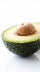 Sticker - Closeup of a halved avocado with a visible pit