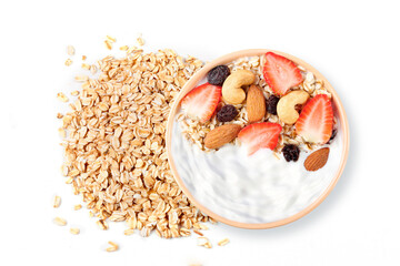 natural yogurt with oats and nuts in ceramic bowl top view isolated white background