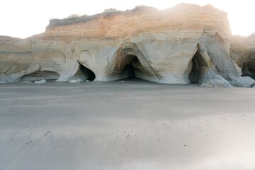 Wall Mural - Caves in the coastal rock on the beach, the Waverley Beach Caves