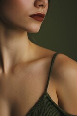 Poster - A close-up shot of a woman wearing a green top
