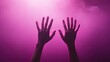 © Sumet - Hands reaching upward against a vibrant purple haze, symbolizing freedom, expression, and creativity in a dreamlike atmosphere.