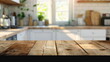 © waranyu - Wooden table on blurred kitchen