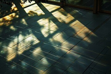 Canvas Print - Shadow of a bicycle cast on a tiled floor, creating a distinct pattern of light and dark shapes, Shadows dancing across the array of solar panels