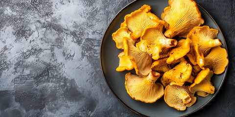 Wall Mural - Sliced chanterelle mushrooms arranged in a fan shape on a plate