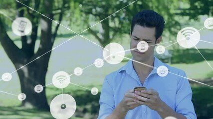 Poster - Using smartphone, man surrounded by network connectivity icons animation over park background