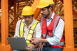 © chachamp - Asia engineer man worker use tablet computer and India engineer man use walkie talkie working with crane spare part background