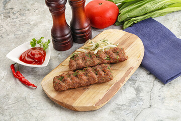 Kebab with beef served onion