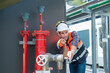 © Washburn - Engineer under checking the industry Fire Protection system
