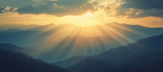 Poster - Sunrise over the mountains with sunbeams.