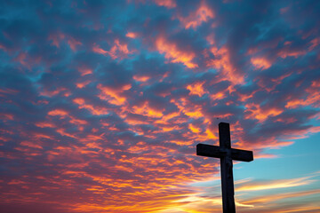 Poster - Cross on colorful sunset sky background


