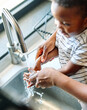 © Lumos sp - child mother hand hygiene family water clean care washing boy son soap woman bathroom together health female little healthy sink home routine morning parent cleaning kid