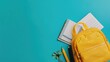 © Tnzal - Yellow backpack with books and school supplies on blue background. AI generated illustration.