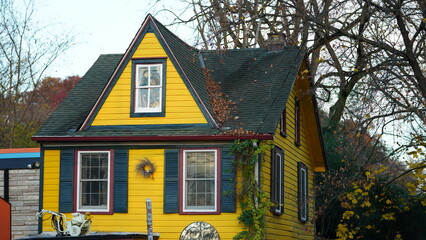 The beautiful little town landscape with the colorful autumn leaves and old buildings in USA