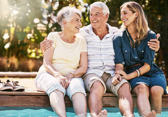 Canvas Print - Happy, family and hug at pool in portrait together for bonding, reunion and support in retirement . Smile, senior parents and adult daughter with love embrace for wellness and rest with lens flare