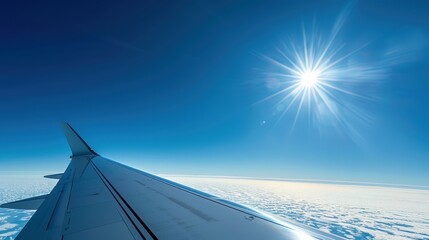 Wall Mural - Airplane Wing View with Sun Shining Bright