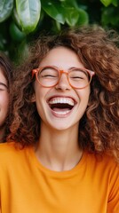 Wall Mural - A diverse group of friends laughing together in an outdoor setting, symbolizing joy and connection