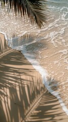 Poster - A palm tree is on the beach, and the water is crashing against the shore