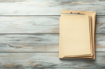 Wall Mural - Stack of Folders on a Wooden Surface