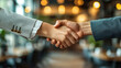 © tong2530 - Colleagues shaking hands or hugging at the end of a workday, representing the end of a professional relationship.