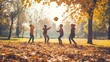 © Felippe Lopes - Four children play with a ball in a park during autumn.