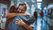 © Hanna - A heartfelt embrace between a nurse and a patient in a hospital corridor during early evening hours