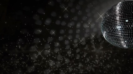 Poster - Disco ball spinning with sparkling lights animation over dark background