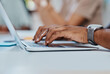 © HockleyM3/peopleimages.com - Hands, typing and person in office with laptop for email, communication and business closeup. Startup, career and public relations worker with online report for brand image management in workplace